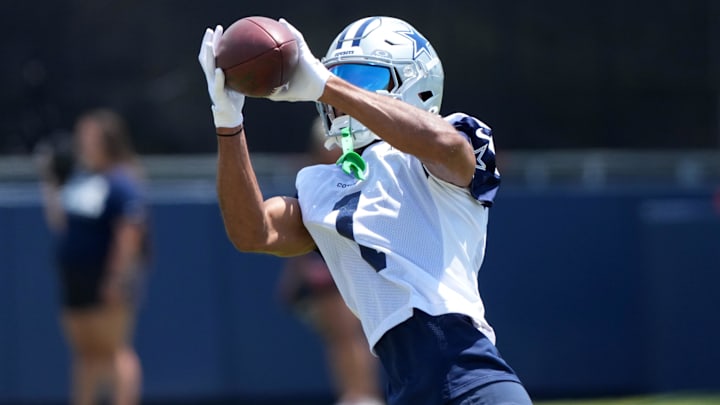 Dallas Cowboys receiver Jalen Tolbert catches the ball at training camp at the River Ridge Fields. Dallas Cowboys receiver Jalen Tolbert catches the ball at training camp at the River Ridge Fields.