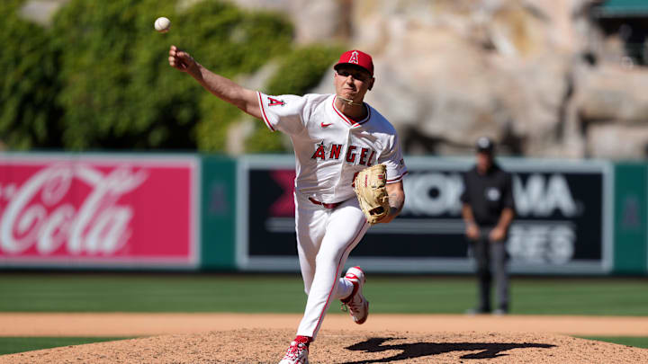 Apr 20, 2025; Anaheim, California, USA; Los Angeles Angels relief pitcher Michael Darrell-Hicks (61) throws in the eighth inning against the San Francisco Giants at Angel Stadium. Mandatory Credit: Kirby Lee-Imagn Images