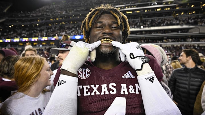 Nov 26, 2022; College Station, Texas, USA; Texas A&M Aggies defensive lineman Shemar Stewart (4) shows off his gold grill smile after the Aggies defeat the LSU Tigers at Kyle Field. Mandatory Credit: Jerome Miron-Imagn Images Nov 26, 2022; College Station, Texas, USA; Texas A&M Aggies defensive lineman Shemar Stewart (4) shows off his gold grill smile after the Aggies defeat the LSU Tigers at Kyle Field. Mandatory Credit: Jerome Miron-Imagn Images
