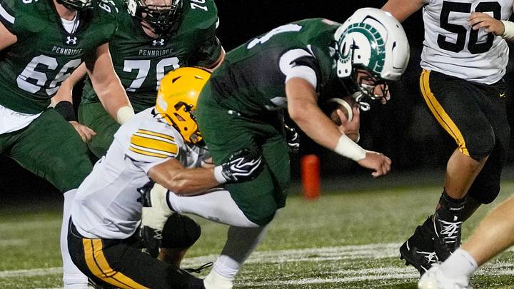 Pennridge's Matt Schafer, 44, picks up yardage against Central Bucks West in Week Four of Bucks County football on Friday, Sept. 18, 2026, at Helman Field. Pennridge's Matt Schafer, 44, picks up yardage against Central Bucks West in Week Four of Bucks County football on Friday, Sept. 18, 2026, at Helman Field.