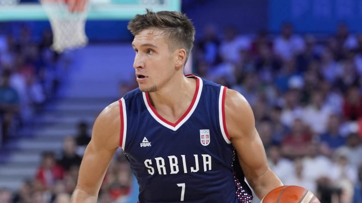 Jul 31, 2024; Villeneuve-d'Ascq, France; Serbia shooting guard Bogdan Bogdanovic (7) dribbles in the second quarter against Puerto Rico during the Paris 2024 Olympic Summer Games at Stade Pierre-Mauroy. Mandatory Credit: John David Mercer-USA TODAY Sports Jul 31, 2024; Villeneuve-d'Ascq, France; Serbia shooting guard Bogdan Bogdanovic (7) dribbles in the second quarter against Puerto Rico during the Paris 2024 Olympic Summer Games at Stade Pierre-Mauroy. Mandatory Credit: John David Mercer-USA TODAY Sports