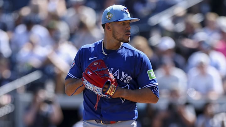 Feb 28, 2026; Tampa, Florida, USA; Toronto Blue Jays starting pitcher Jose Berrios (17) throws a pitch against the New York Yankees in the first inning during spring training at George M. Steinbrenner Field. 