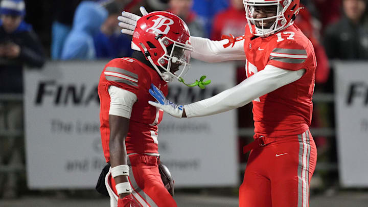 Baylor's Jamyan Theodore (5) and Cameron Sparks (17) celebrating Theodore's touchdown in the TSSAA Division II-AAA high school football championship game against McCallie on Thursday, Dec. 5, 2024, in Chattanooga, Tenn.