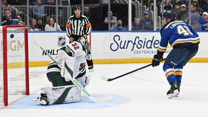Apr 13, 2026; St. Louis, Missouri, USA; St. Louis Blues defenseman Theo Lindstein (41) scores a goal past Minnesota Wild goaltender Filip Gustavsson (32) in the second period at Enterprise Center. Mandatory Credit: Joe Puetz-Imagn Images