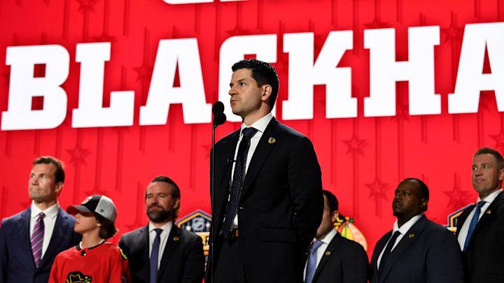 Jun 28, 2023; Nashville, Tennessee, USA; Chicago Blackhawks general manager Kyle Davidson makes the nineteenth pick in round one of the 2023 NHL Draft at Bridgestone Arena. Mandatory Credit: Christopher Hanewinckel-Imagn Images