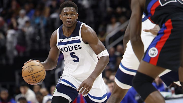 Jan 4, 2025; Detroit, Michigan, USA;  Minnesota Timberwolves guard Anthony Edwards (5) dribbles in the second half against the Detroit Pistons at Little Caesars Arena. Mandatory Credit: Rick Osentoski-Imagn Images