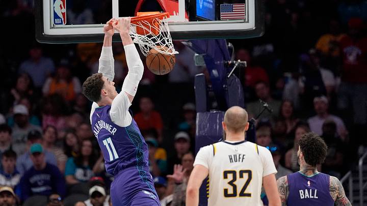Apr 3, 2026; Charlotte, North Carolina, USA; Charlotte Hornets center Ryan Kalkbrenner (11) makes a slam dunk Apr 3, 2026; Charlotte, North Carolina, USA; Charlotte Hornets center Ryan Kalkbrenner (11) makes a slam dunk