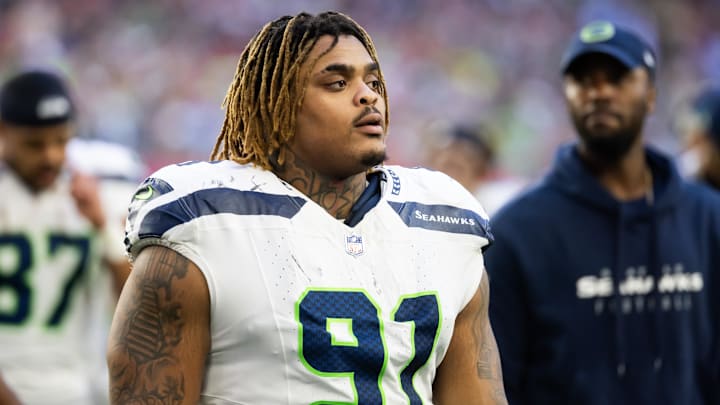 Dec 8, 2024; Glendale, Arizona, USA; Seattle Seahawks defensive tackle Byron Murphy II (91) against the Arizona Cardinals at State Farm Stadium. Mandatory Credit: Mark J. Rebilas-Imagn Images