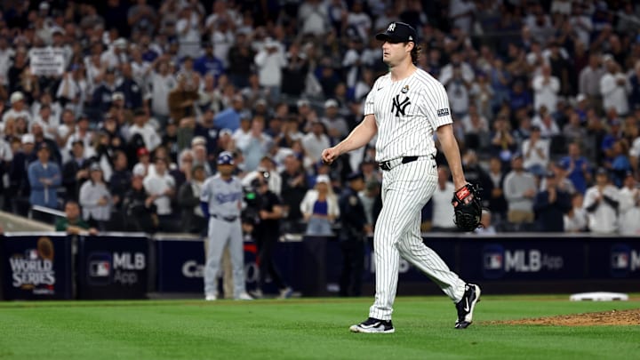 Oct 30, 2024; New York, New York, USA; New York Yankees pitcher Gerrit Cole (45) is removed from the game during the seventh inning against the Los Angeles Dodgers in game five of the 2024 MLB World Series at Yankee Stadium. Mandatory Credit: Vincent Carchietta-Imagn Images