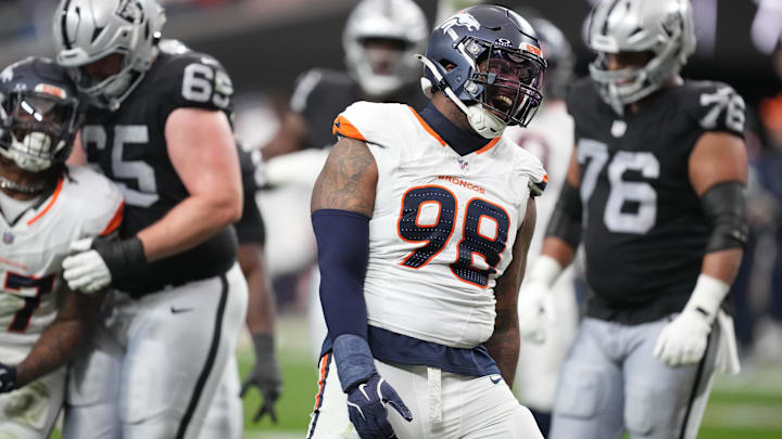 Dec 7, 2025; Paradise, Nevada, USA;  Denver Broncos defensive end John Franklin-Myers (98) reacts after a sack against the Las Vegas Raiders during the first half at Allegiant Stadium. Mandatory Credit: Kirby Lee-Imagn Images