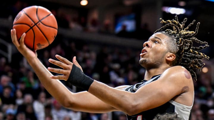 Orchard Lake St. Mary's Trey McKenney scores against East Lansing during the third quarter in the Division 1 state semifinal on Friday, March 14, 2025, at the Breslin Center in East Lansing.