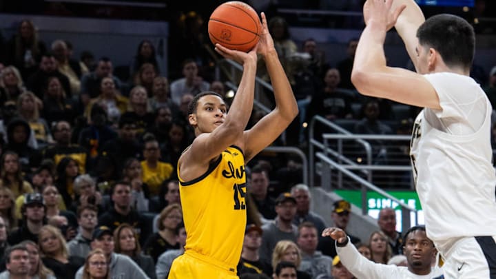 Mar 13, 2022; Indianapolis, IN, USA; Iowa Hawkeyes forward Keegan Murray (15) shoots the ball while Purdue Boilermakers center Zach Edey (15) defends in the second half at Gainbridge Fieldhouse. Mandatory Credit: Trevor Ruszkowski-Imagn Images Mar 13, 2022; Indianapolis, IN, USA; Iowa Hawkeyes forward Keegan Murray (15) shoots the ball while Purdue Boilermakers center Zach Edey (15) defends in the second half at Gainbridge Fieldhouse. Mandatory Credit: Trevor Ruszkowski-Imagn Images