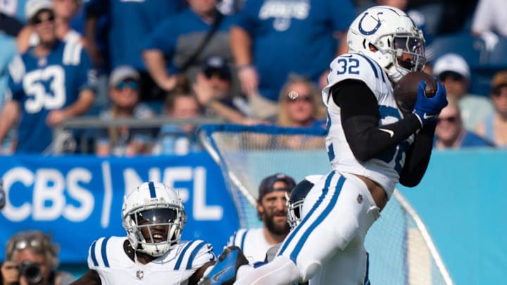 Indianapolis Colts safety Julian Blackmon (32) intercepts a pass intended for Tennessee Titans wide receiver Calvin Ridley (0) in the fourth quarter of their game at Nissan Stadium in Nashville, Tenn., Monday, Oct. 14, 2024.