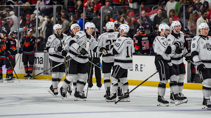 Ontario Reign players celebrate a win over the Coachella Valley Firebirds after a shootout at Acrisure Arena in Palm Desert, Calif., Saturday, Dec. 28, 2024.