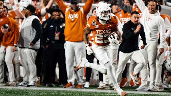 Texas Longhorns running back Jaydon Blue (23) runs the ball in for a touchdown in the fourth quarter as the Texas Longhorns play the Clemson Tigers in the first round of the College Football Playoffs at Darrell K Royal Texas Memorial Stadium in Austin, Texas, Dec. 21, 2024.