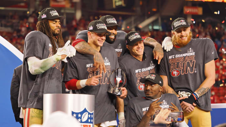 Jan 28, 2024; Santa Clara, California, USA; (Left to right) San Francisco 49ers linebacker Fred Warner (54), quarterback Brock Purdy (13), offensive tackle Trent Williams (71), running back Christian McCaffrey (23), wide receiver Deebo Samuel (19), and tight end George Kittle (85) celebrate after winning the NFC Championship football game against the Detroit Lions at Levi's Stadium. Mandatory Credit: Kelley L Cox-USA TODAY Sports
