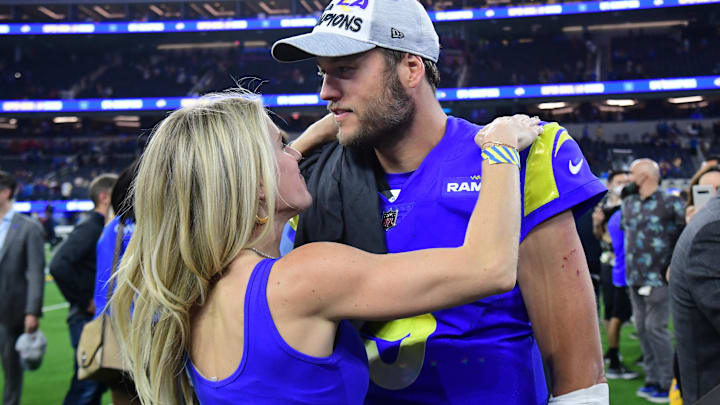 Los Angeles Rams quarterback Matthew Stafford (9) with wife Kelly Hall after defeating the San Francisco 49ers in the NFC Championship Game at SoFi Stadium.