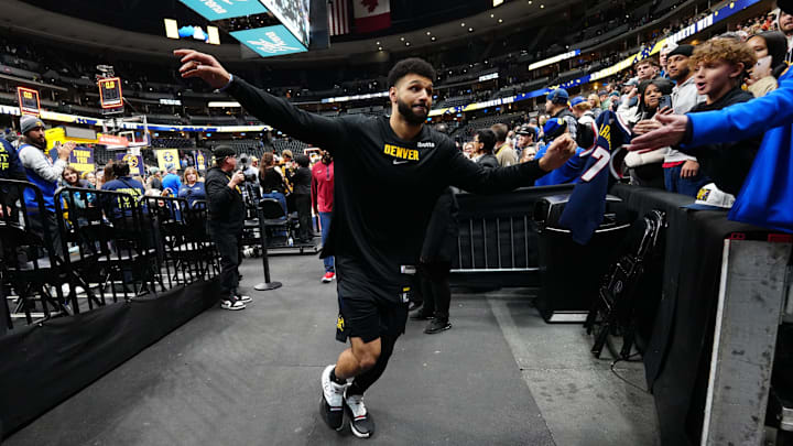 Jan 7, 2024; Denver, Colorado, USA; Denver Nuggets guard Jamal Murray (27) leaves the court following the win over the Detroit Pistons at Ball Arena. Mandatory Credit: Ron Chenoy-Imagn Images