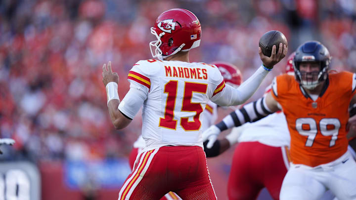 Nov 16, 2025; Denver, Colorado, USA; Kansas City Chiefs quarterback Patrick Mahomes (15) prepares to pass in the first half against the Denver Broncos at Empower Field at Mile High. Mandatory Credit: Ron Chenoy-Imagn Images
