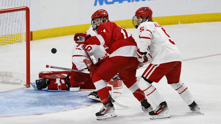 Mar 29, 2025; Toledo, OH, USA; Cornell forward Ryan Walsh (14) looks for a rebound in the first period against the Boston University at Huntington Center. Mandatory Credit: Rick Osentoski-Imagn Images