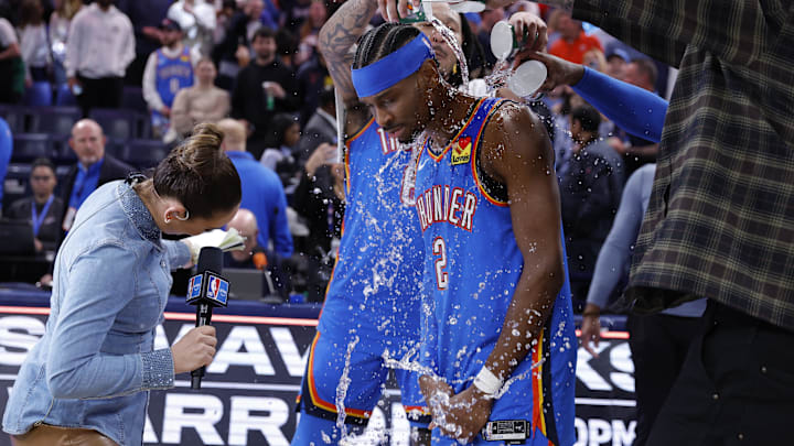 Mar 12, 2026; Oklahoma City, Oklahoma, USA; Oklahoma City Thunder guard Shai Gilgeous-Alexander’s teammate pour water on him at the end of a game against the Boston Celtics during the fourth quarter at Paycom Center. Mandatory Credit: Alonzo Adams-Imagn Images