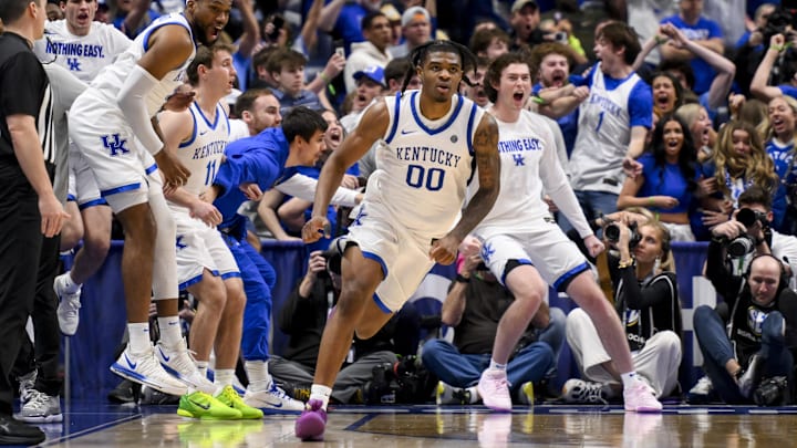 Mar 13, 2025; Nashville, TN, USA;  Kentucky Wildcats guard Otega Oweh (00) reacts after hitting the game winner as time runs out against the Oklahoma Sooners during the second half at Bridgestone Arena. Mandatory Credit: Steve Roberts-Imagn Images