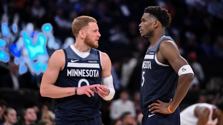 Oct 9, 2025; New York, New York, USA; Minnesota Timberwolves guard Donte Divincenzo and guard Anthony Edwards (5) talk during the second half against the New York Knicks at Madison Square Garden.