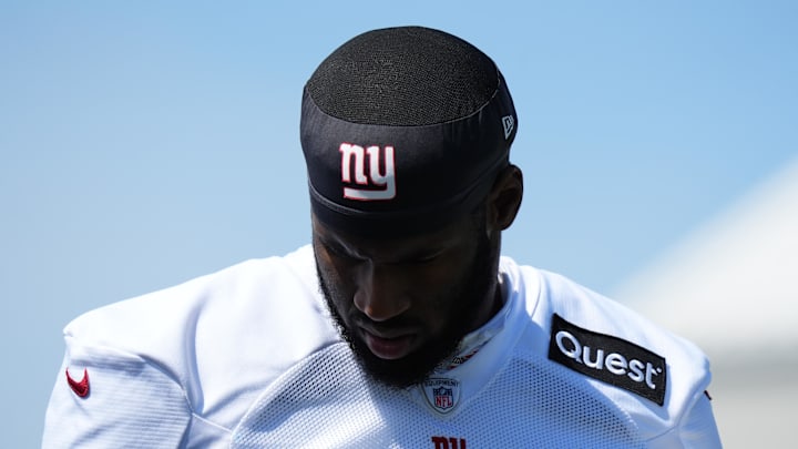 Jul 26, 2024; East Rutherford, NJ, USA; New York Giants linebacker Brian Burns (0) walks the sideline during training camp at Quest Diagnostics Training Center.  