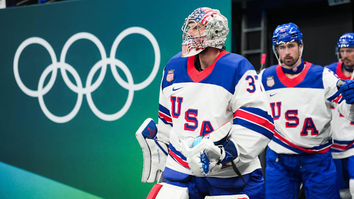 Feb 20, 2026; Milan, Italy; Connor Hellebuyck (37) of the United States takes the ice before the game against Slovakia in a men's ice hockey semifinal during the Milano Cortina 2026 Olympic Winter Games at Milano Santagiulia Ice Hockey Arena. Mandatory Credit: James Lang-Imagn Images