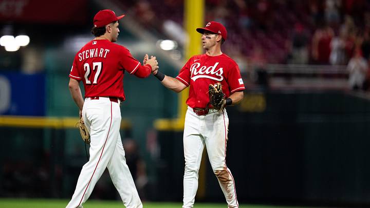 Cincinnati Reds third baseman Sal Stewart (27) greats Cincinnati Reds first baseman Spencer Steer (7) after the Cincinnati Reds defeated the Philadelphia Phillies at Great American Ball Park in Cincinnati on Wednesday, July 8, 2026.