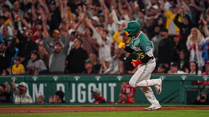 Jun 13, 2025; Boston, Massachusetts, USA; Boston Red Sox catcher Carlos Narváez (75) hits a game winning single to center field against the New York Yankees in the tenth inning at Fenway Park. Mandatory Credit: David Butler II-Imagn Images