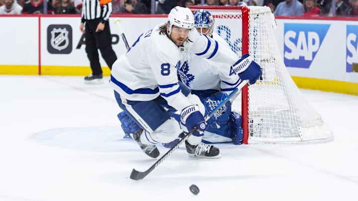 May 1, 2025; Ottawa, Ontario, CAN; Toronto Maple Leafs defenseman Christopher Tanev (8) chases the puck in game six of the first round of the 2025 Stanley Cup Playoffs against the Ottawa Senators at Canadian Tire Centre. Mandatory Credit: Marc DesRosiers-Imagn Images