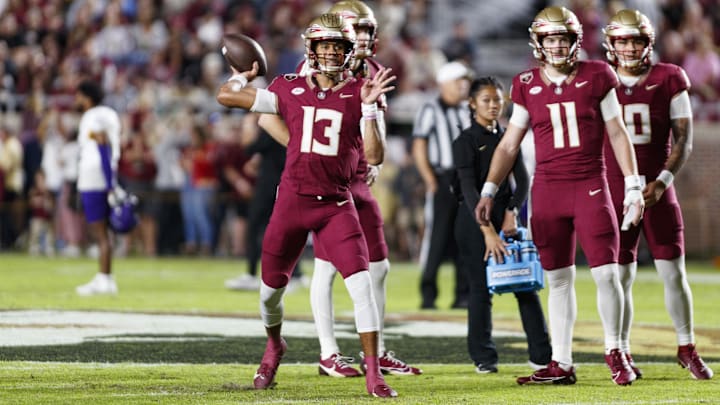 Nov 18, 2023; Tallahassee, Florida, USA; Florida State Seminoles quarterback Jordan Travis (13) throws a pass during the warm ups against the North Alabama Lions at Doak S. Campbell Stadium. Mandatory Credit: Morgan Tencza-Imagn Images