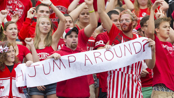 Sep 20, 2014; Madison, WI, USA; Wisconsin Badgers fans take part in the traditional Jump Around between the third and fourth quarters against the Wisconsin Badgers at Camp Randall Stadium.   Wisconsin won 68-17.  Mandatory Credit: Jeff Hanisch-Imagn Images