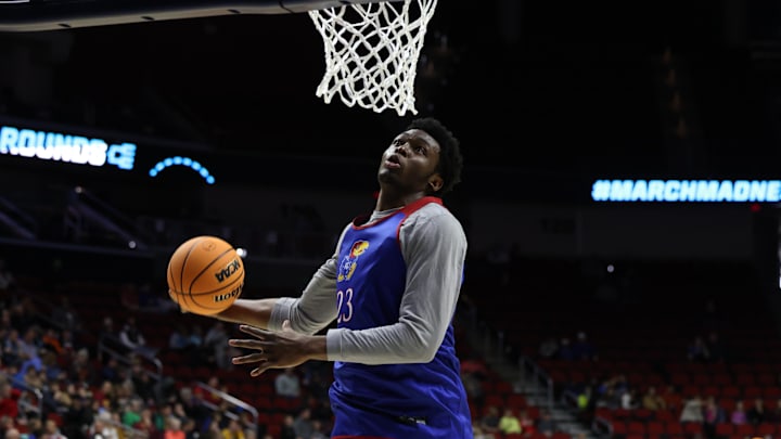 Mar 15, 2023; Des Moines, IA, USA; Kansas Jayhawks center Ernest Udeh Jr. (23) dunks during their shootaround