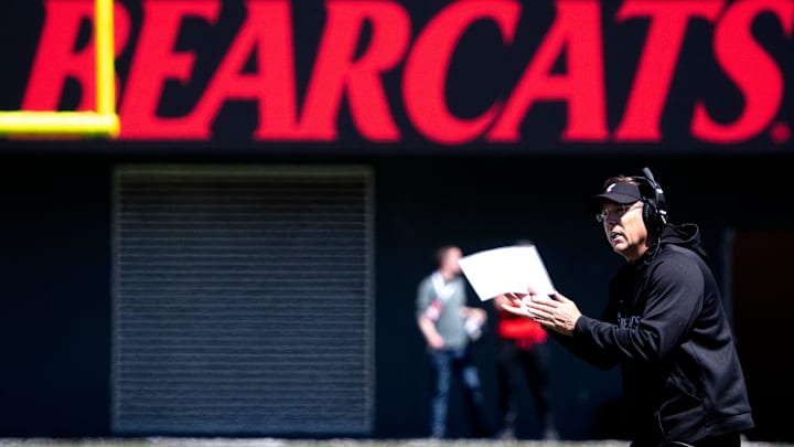Cincinnati Bearcats head coach Scott Satterfield claps after a good field goal during the University of Cincinnati annual Red and Black Spring football game and practice at Nippert Stadium in Cincinnati on Saturday, April 13, 2024.