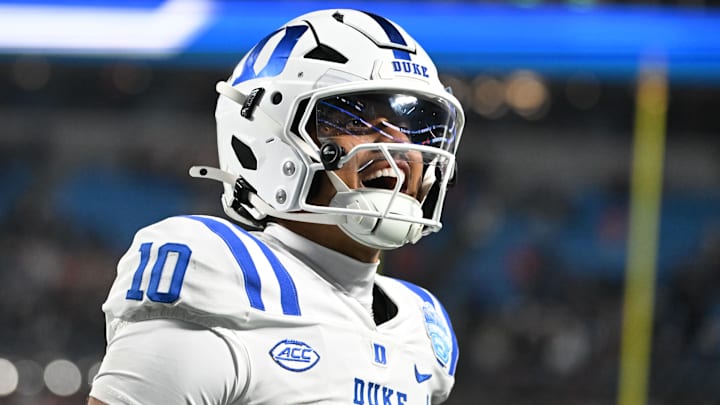 Duke Blue Devils quarterback Darian Mensah (10) celebrates after the Blue Devils score a touchdown in overtime during the  ACC Championship game