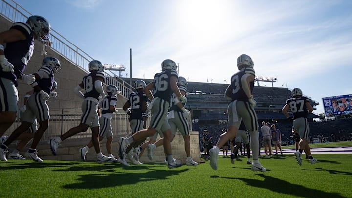 Kansas State Wildcats take the field before the game against UCF Knights at Bill Snyder Family Stadium.