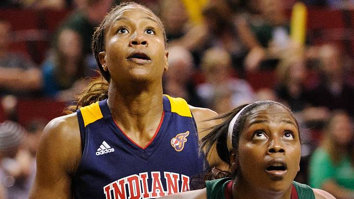 Aug 23, 2012; Seattle, WA, USA; Seattle Storm forward Camille Little (20) blocks out Indiana Fever forward Tamika Catchings (24) during the game at KeyArena. Indiana defeated Seattle 68-66. Mandatory Credit: Steven Bisig-Imagn Images