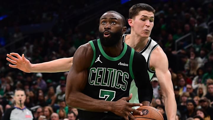 Nov 21, 2025; Boston, Massachusetts, USA; Brooklyn Nets guard Egor Demin (8) tries to poke the ball from Boston Celtics guard Jaylen Brown (7) during the second half at TD Garden. Mandatory Credit: Bob DeChiara-Imagn Images
