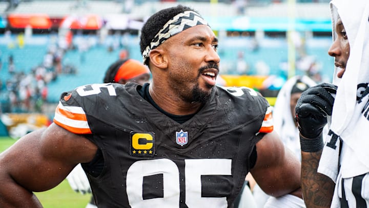 Sep 15, 2024; Jacksonville, Florida, USA; Cleveland Browns defensive end Myles Garrett (95) talks with Jacksonville Jaguars defensive end Josh Hines-Allen (41) after a game at EverBank Stadium. Mandatory Credit: Jeremy Reper-Imagn Images