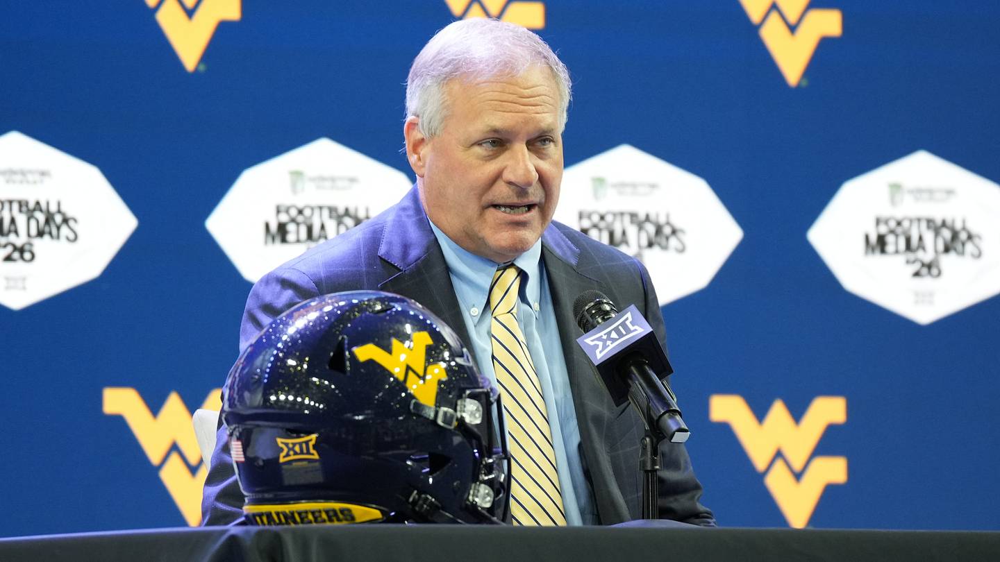 West Virginia University Defensive Coordinator Zac Alley and Christopher Hall
