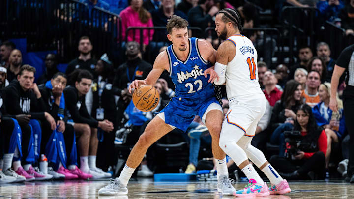 Orlando Magic forward Franz Wagner (22) dribbles the ball against New York Knicks guard Jalen Brunson (11) in the second quarter at KIA Center.