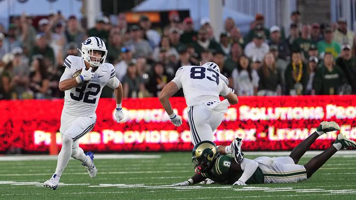 Sep 19, 2026; Fort Collins, Colorado, USA;  BYU Cougars cornerback Cannon DeVries (32) returns a punt in the first half against CSU Rams at Sonny Lubick Field at Canvas Stadium.  Mandatory Credit: Andrew Rydland-Imagn Images