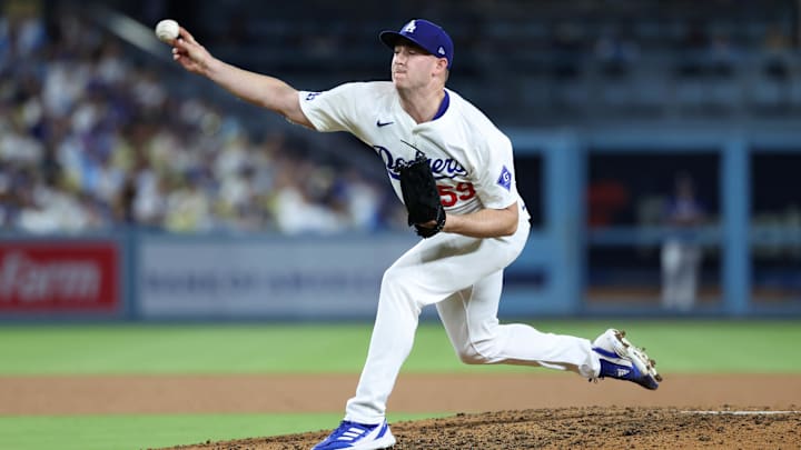Sep 10, 2024; Los Angeles, California, USA;  Los Angeles Dodgers relief pitcher Evan Phillips (59) pitches during the eighth inning against the Chicago Cubs at Dodger Stadium. Mandatory Credit: Kiyoshi Mio-Imagn Images