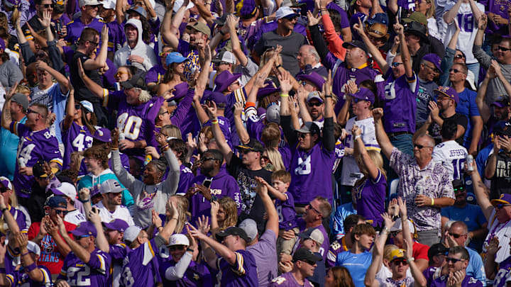 Minnesota Vikings fans celebrate a touchdown by wide receiver Jordan Addison (3) in the first quarter at Nissan Stadium in Nashville, Tenn., Sunday, Nov. 17, 2024.