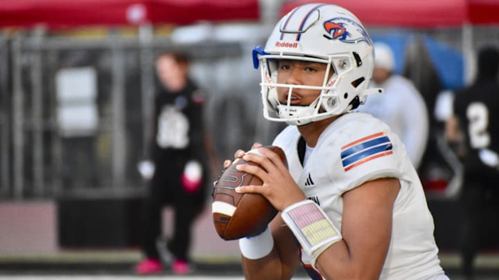 Ninth grader A.J. Tuivaiave passed for a career-high 435 yards and seven touchdown in Graham-Kapowsin's win over Yelm.