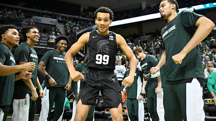Jan 20, 2026; Eugene, Oregon, USA; Michigan State Spartans guard Divine Ugochukwu (99) is introduced before the game against the Oregon Ducks at Matthew Knight Arena. Mandatory Credit: Craig Strobeck-Imagn Images
