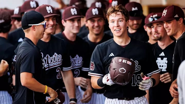 Mississippi State Catcher Andrew Raymond (#19) during the game between the Ole Miss Rebels and the Mississippi State Bulldogs at Swayze Field in Oxford, MS. Mississippi State Catcher Andrew Raymond (#19) during the game between the Ole Miss Rebels and the Mississippi State Bulldogs at Swayze Field in Oxford, MS.