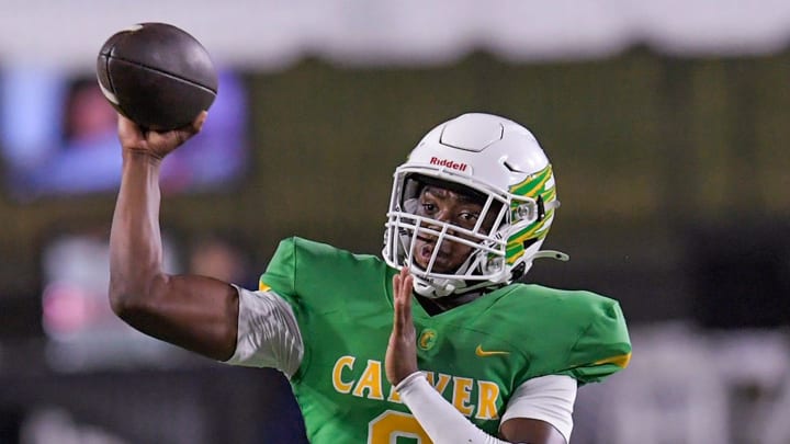 Carver's TJRussell (9) passes against Vestavia Hills during their game at Cramton Bowl in Montgomery, Ala., on Friday August 23, 2024. Carver's TJRussell (9) passes against Vestavia Hills during their game at Cramton Bowl in Montgomery, Ala., on Friday August 23, 2024.